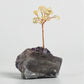 Crystal tree ornament with a base of original stones